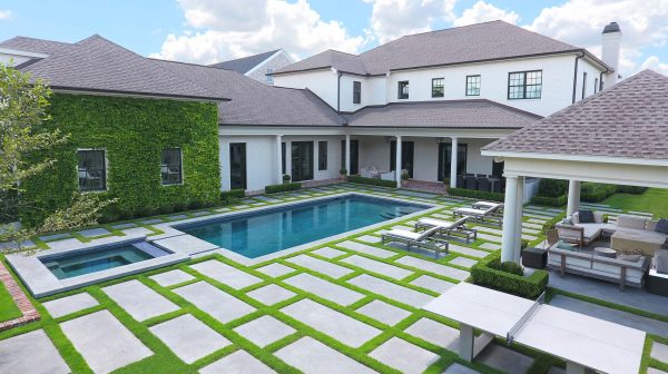 For this project, our approach worked to marry the colonial style of the home with the contemporary landscape requests of the homeowner in a way that was both cohesive and beautiful. Our firm entered the project while the home was still under construction, which provided a blank canvas from the start. Originally, the front lawn […]