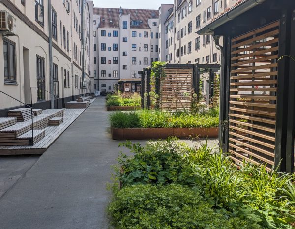 The courtyard at AB Haabet is located on the threshold of Amagerbrogade at Amager, the diverse island connected to Copenhagen’s city center. The courtyard forms an important semi-private urban space for the residents of the cooperative housing association AB Haabet, within a dense and mixed-use neighborhood. The courtyard is constructed above a parking deck established [&hellip;]