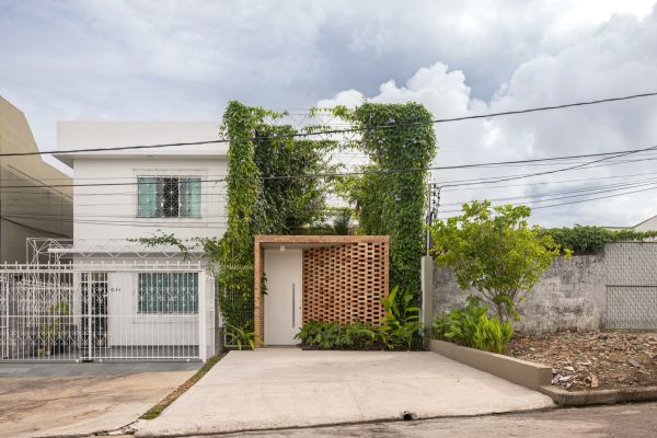 The jury appreciated Tropical Warehouse for its precise play between architectural and vegetative envelopes. On a very limited site, the project creates a green volume as a floating armature around the building, turning planting into shade, increasing privacy, thermal comfort and spatial depth. Both architecture and landscape remain porous, with semi-open spaces, trellis structures and dense planting producing a lively exchange between inside and outside. The jury was convinced by the emplacement of this ambiguity  between what is built and what is grown, between what contains and is contained, and between industrial form and tropical garden.