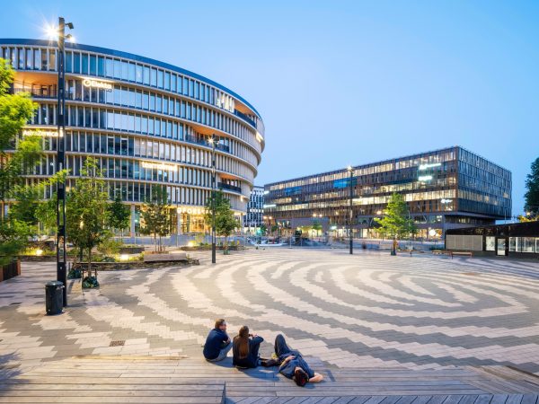 Hagaplan, the new square in Hagastaden, is the central node of a new urban district and the area’s largest and most important public space. The square is located at the boundary between Stockholm and Solna. It serves as a key public transport hub and interchange between the metro and several bus lines. Hagaplan connects Stockholm [&hellip;]